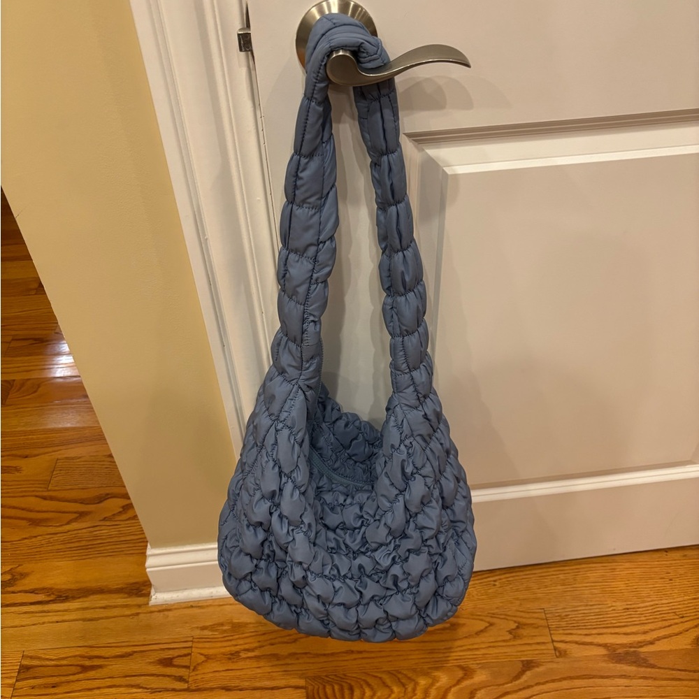 Do Everything in Love Quilted Hobo Bag in Light Blue!